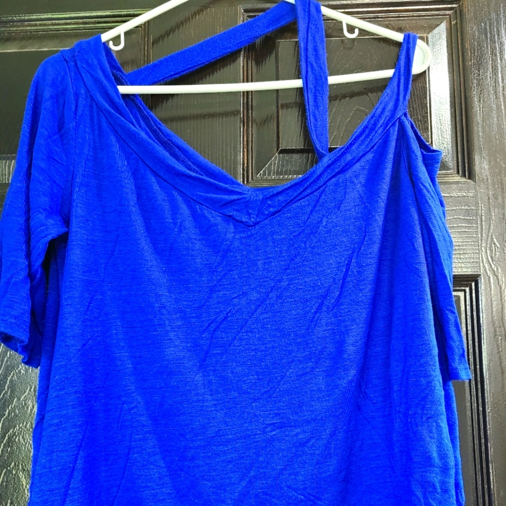 Womens strap and exposed shoulder top
